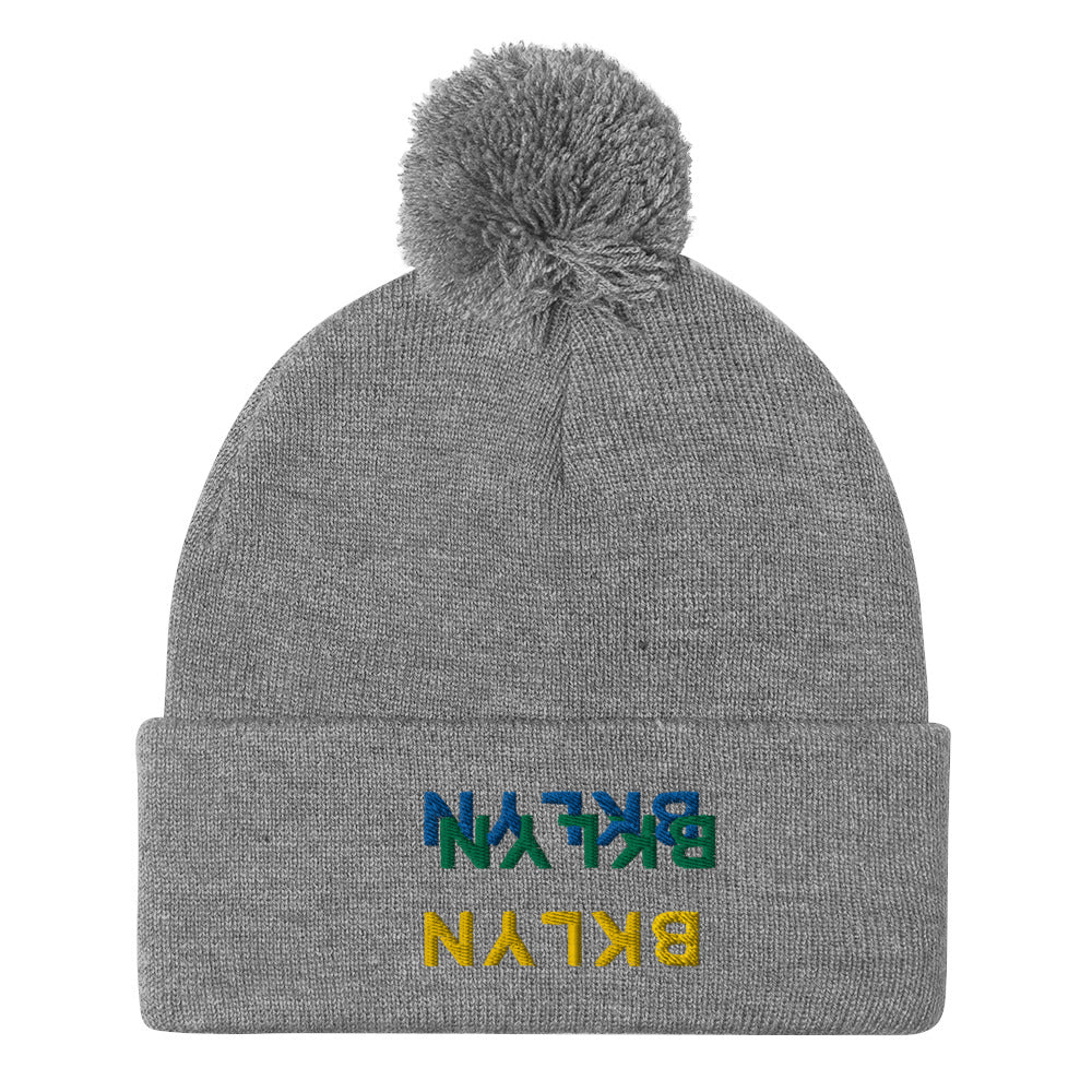 Multiples Pom-Pom Beanie
