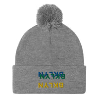 Multiples Pom-Pom Beanie
